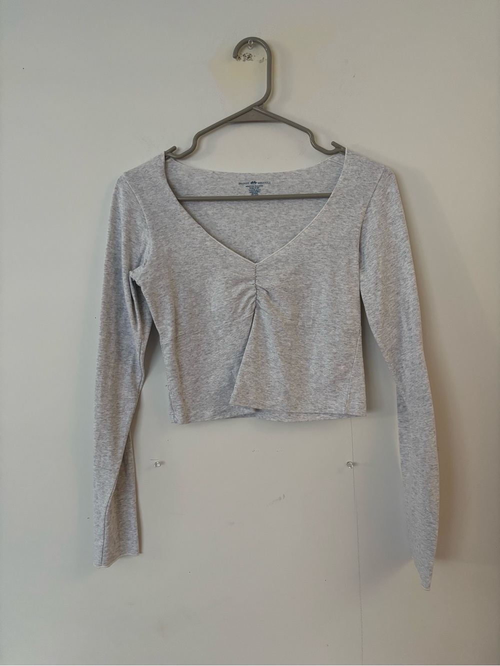 brand new! brandy melville light grey v neck crop long sleeve top 🤍